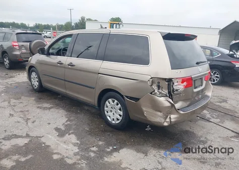 2010 Honda Odyssey Lx z USA, uszkodzony, nr VIN 5FNRL3H29AB009627